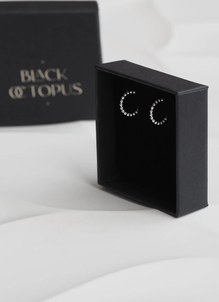 Sterling Silver Mini Beaded Hoop Earrings in Black Earring Box