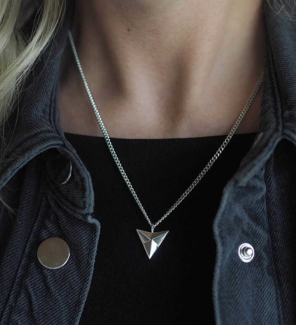 Silver statement arrowhead talisman necklace modelled