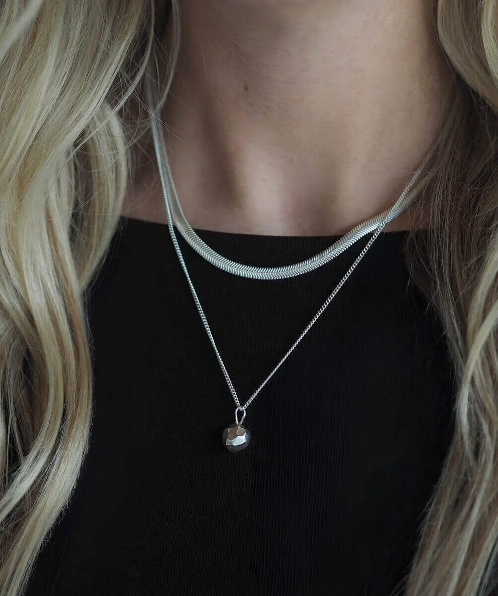 Silver flat snake chain layering necklace modelled