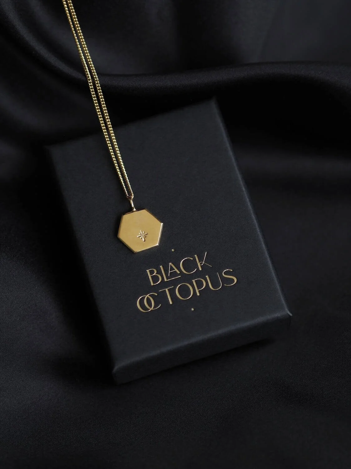 Gold hexagon celestial star pendant on curb chain