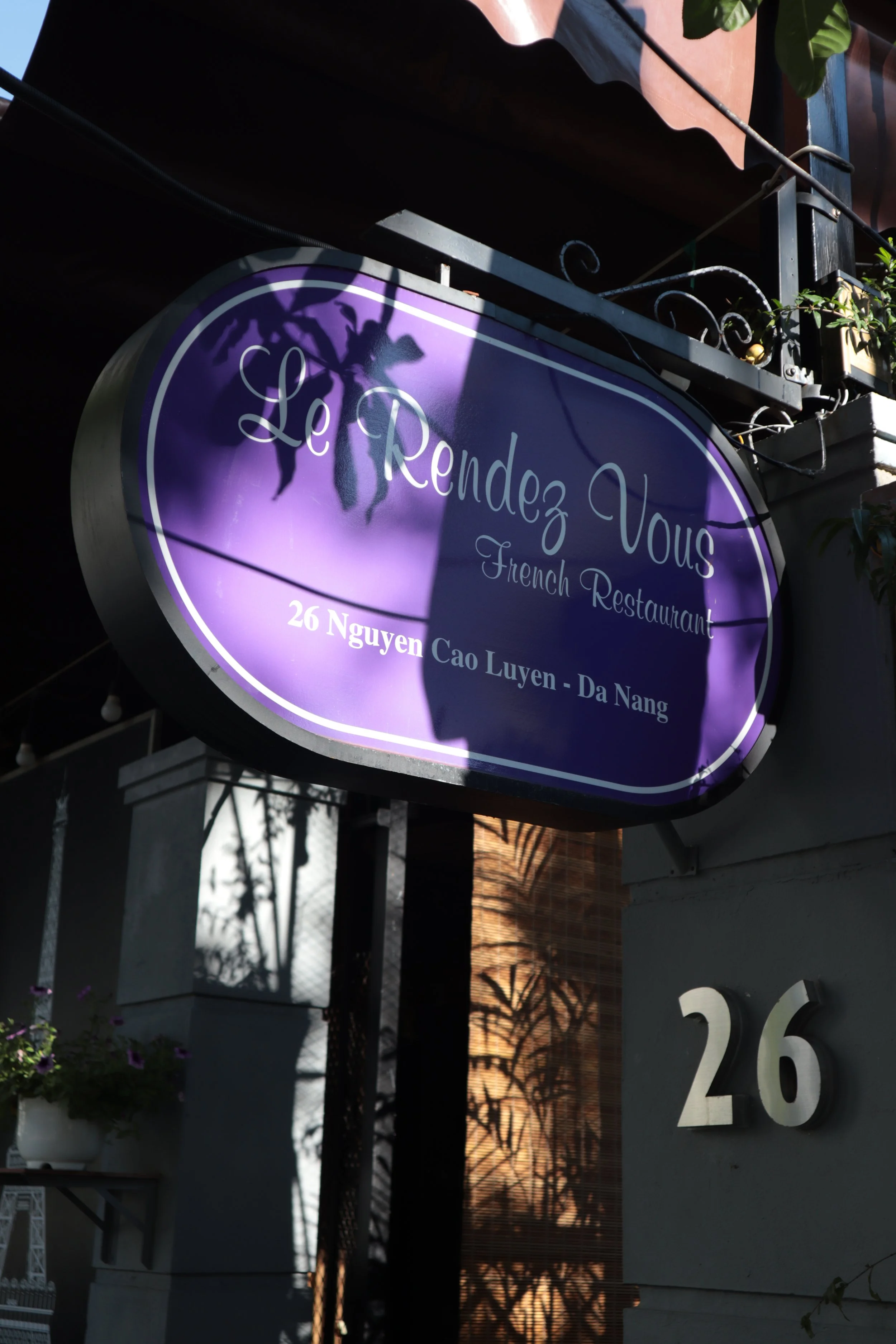 Front signage of Le Rendez-Vous, gourmet French restaurant in Da Nang, Vietnam