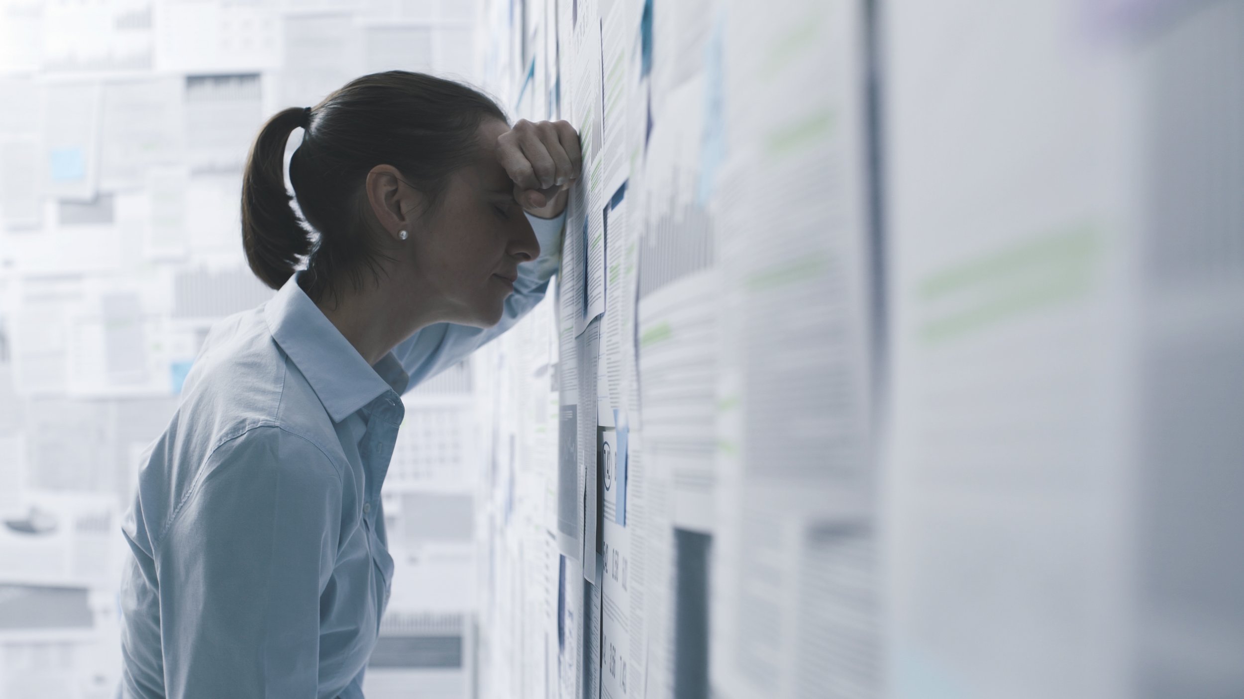 A woman thinking what needs to be done