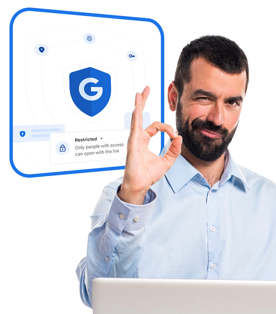 Man in blue shirt holding a laptop, making an OK gesture with right left hand, beside a square containing Google Workspace security features that restrict access.