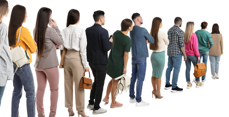 People standing in line against a plain white background.