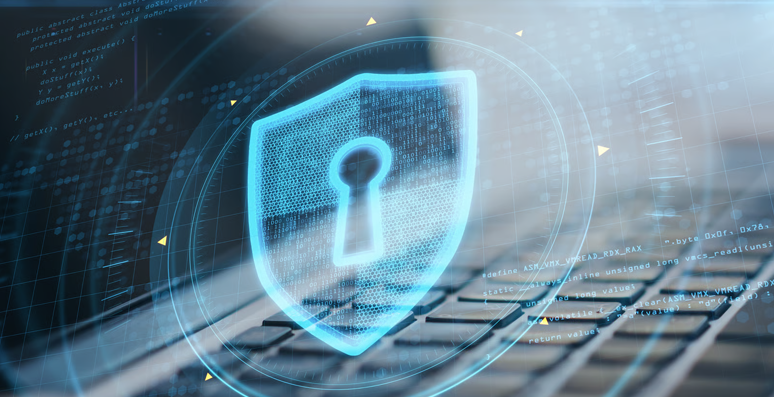 Digital shield icon floating in front of a laptop.
