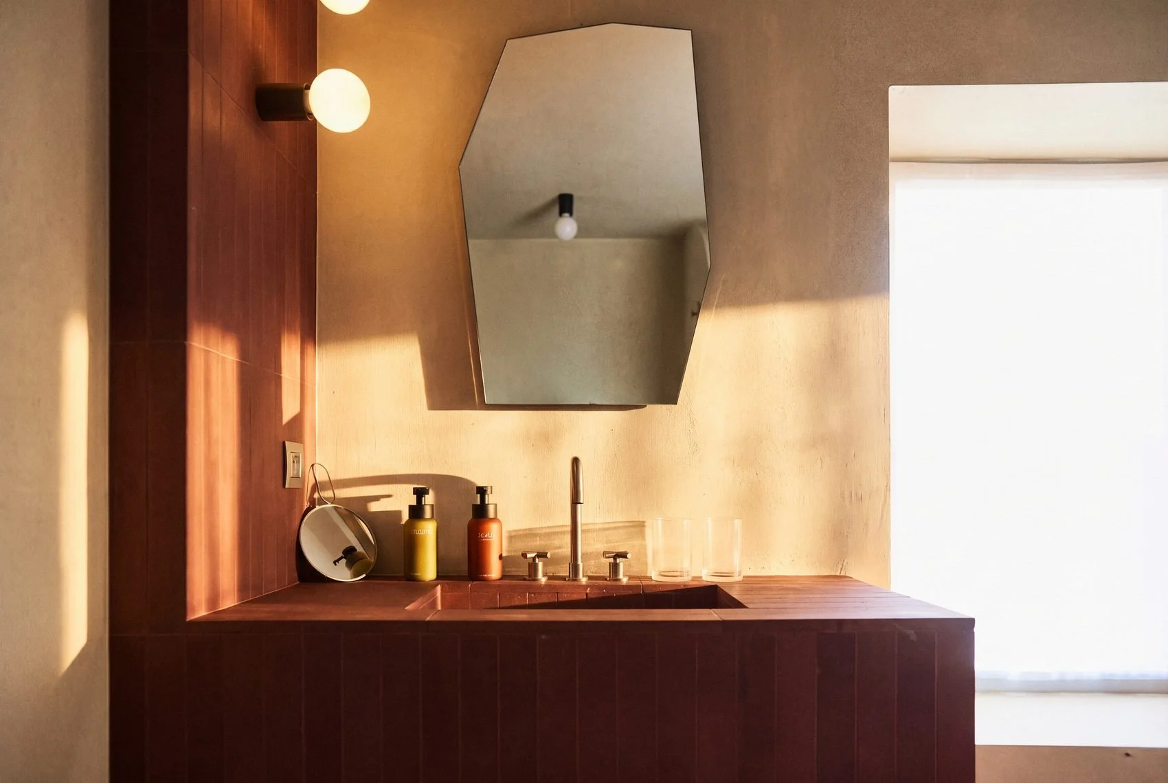 22_bathroom-terracotta-vanity-hexagonal-mirror.jpg