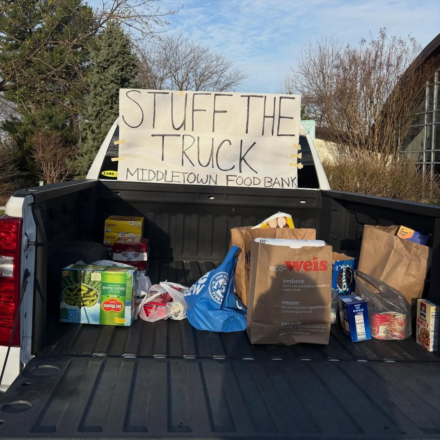 Bring your donations before 11:30 am to the parking lot for the food bank!