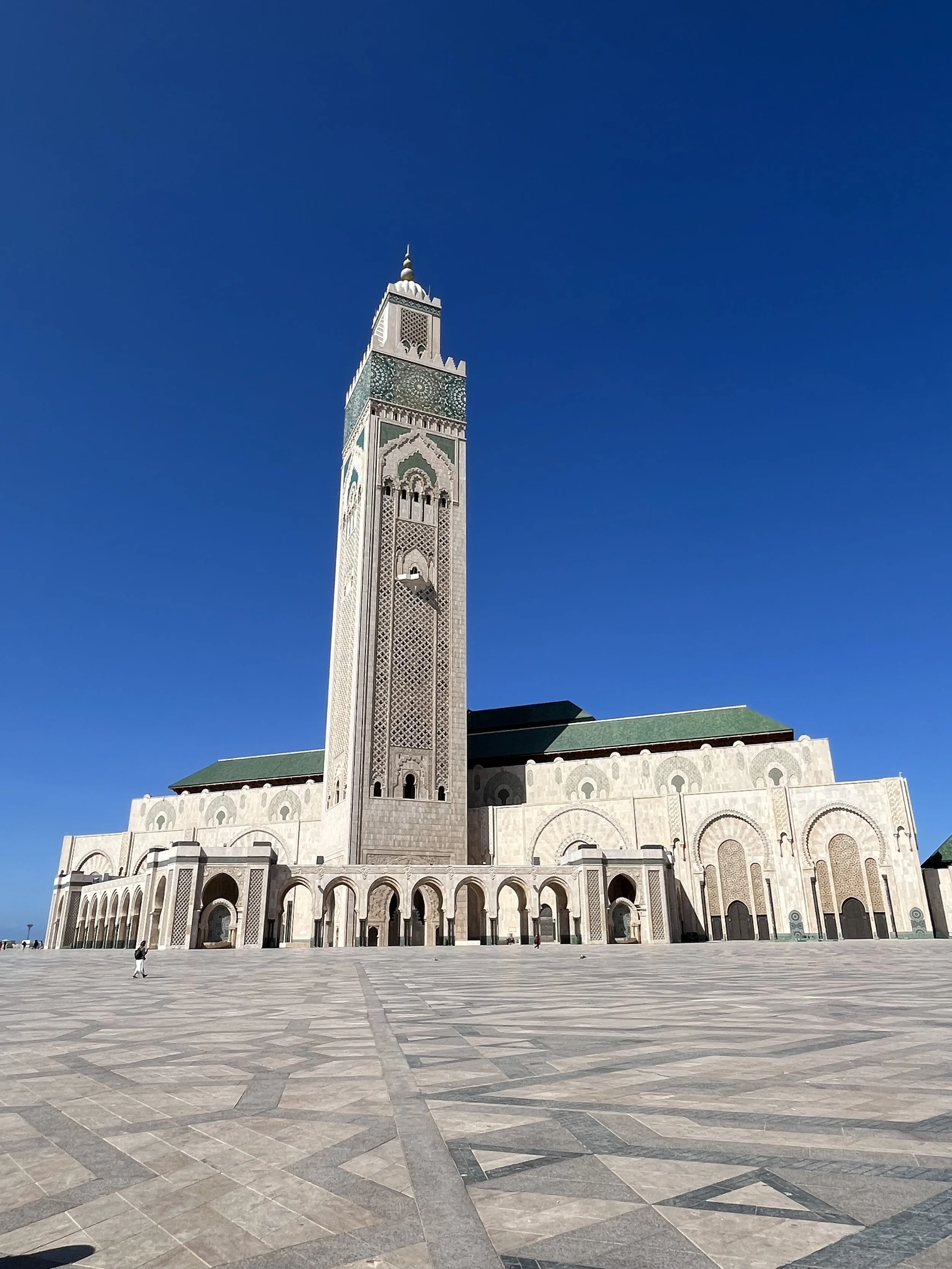 A wide shot of the Hassan II mosque in Casablanca Morocco. The largest mosque in North Africa.