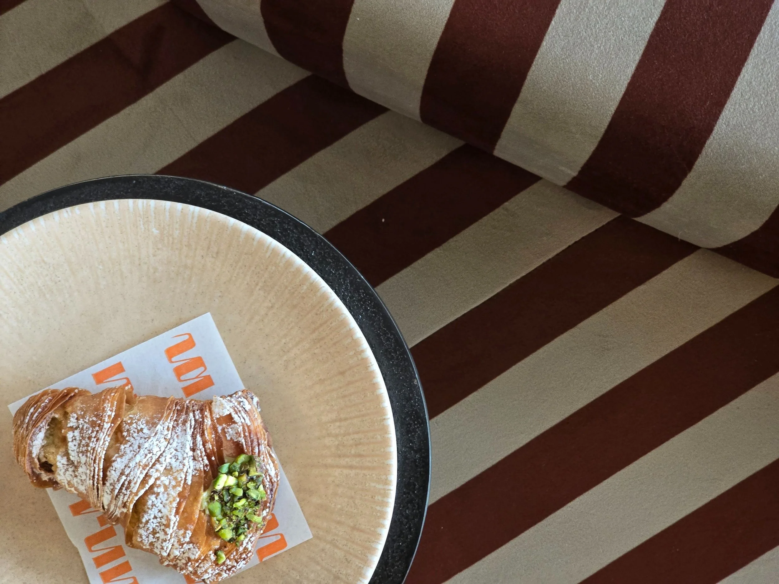 Ruma Dining is an all-day café and restaurant shaped by a thoughtful blend of Asian and Australian influence, brought to life through an earthy, organic design language. The interior is grounded, tactile and warm, celebrating craft, texture and mater