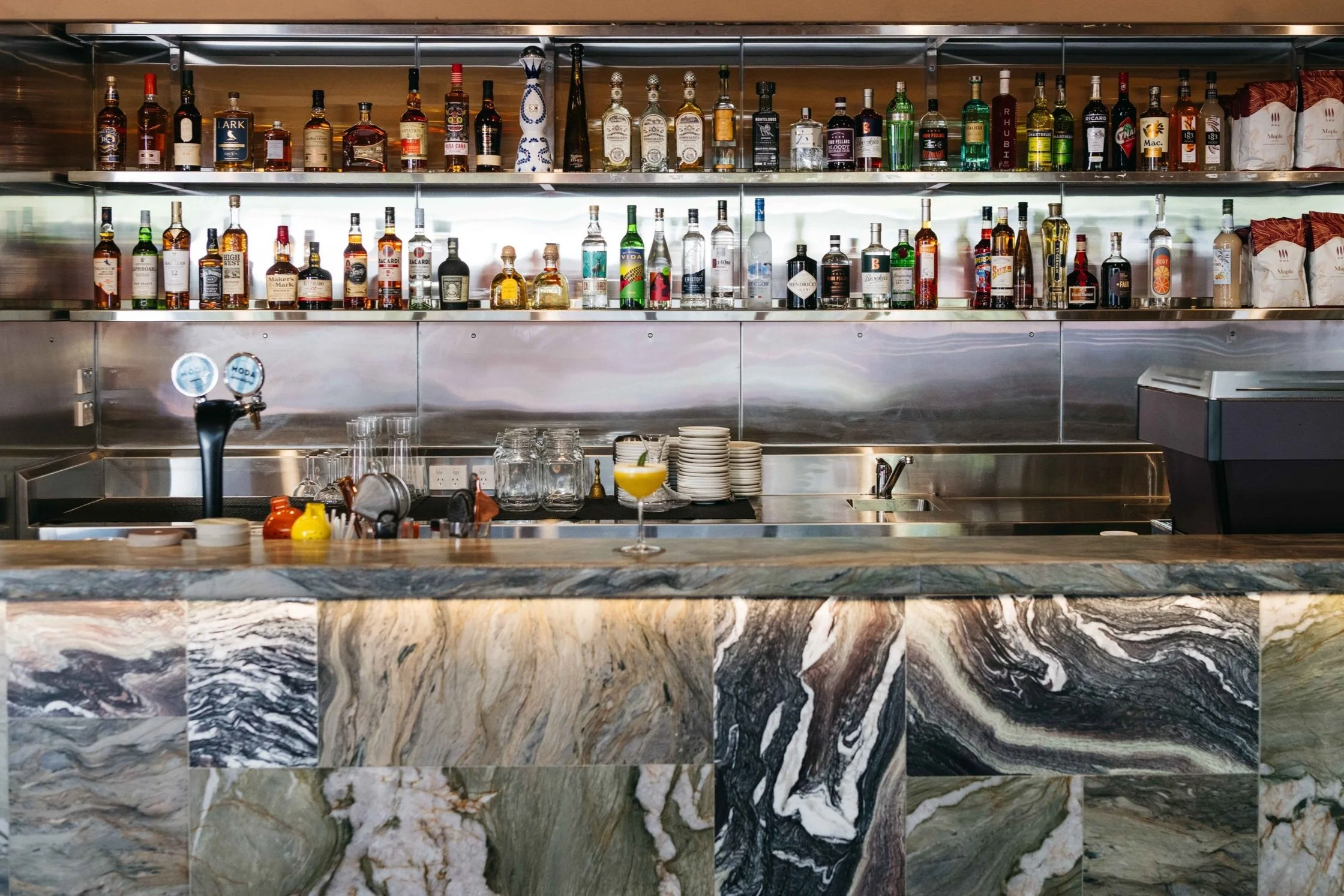 Ruma Dining is an all-day café and restaurant shaped by a thoughtful blend of Asian and Australian influence, brought to life through an earthy, organic design language. The interior is grounded, tactile and warm, celebrating craft, texture and mater
