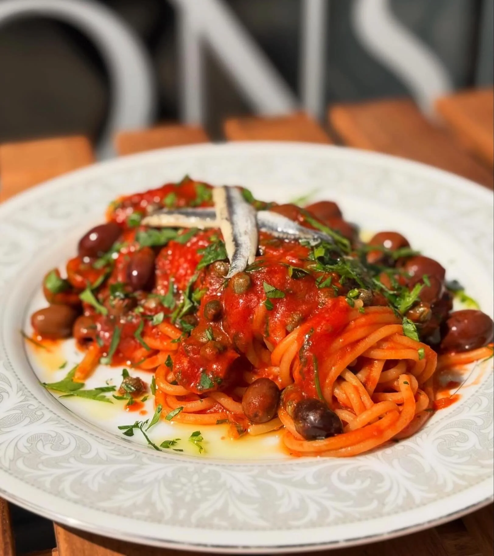 Fragrant, bold, briney, and dreamy! A lot of iconic shelf stable ingredients&mdash;anchovy, olives, capers, tomatoes&mdash;coming together to serve this classic Southern Italian pasta dish. 

Bucatini alla Puttanesca. Italian Tomato, Sicilian Anchory