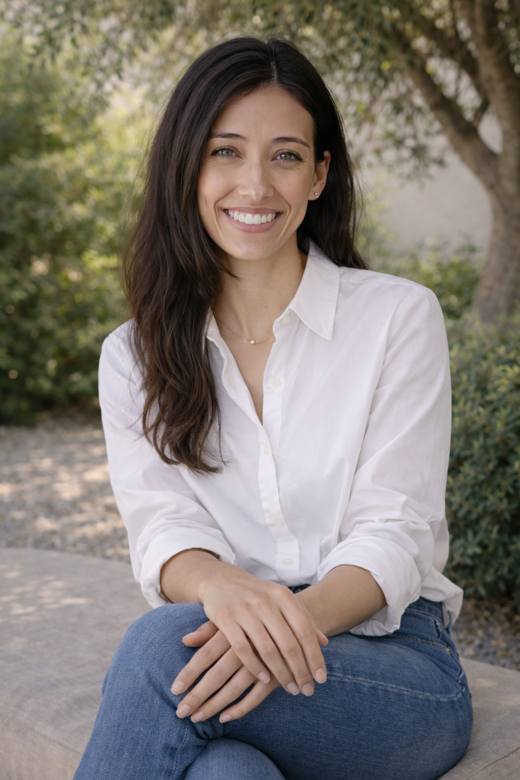 Catherine Alvarado, LMFT sitting outdoors in a relaxed setting in Redondo Beach, CA