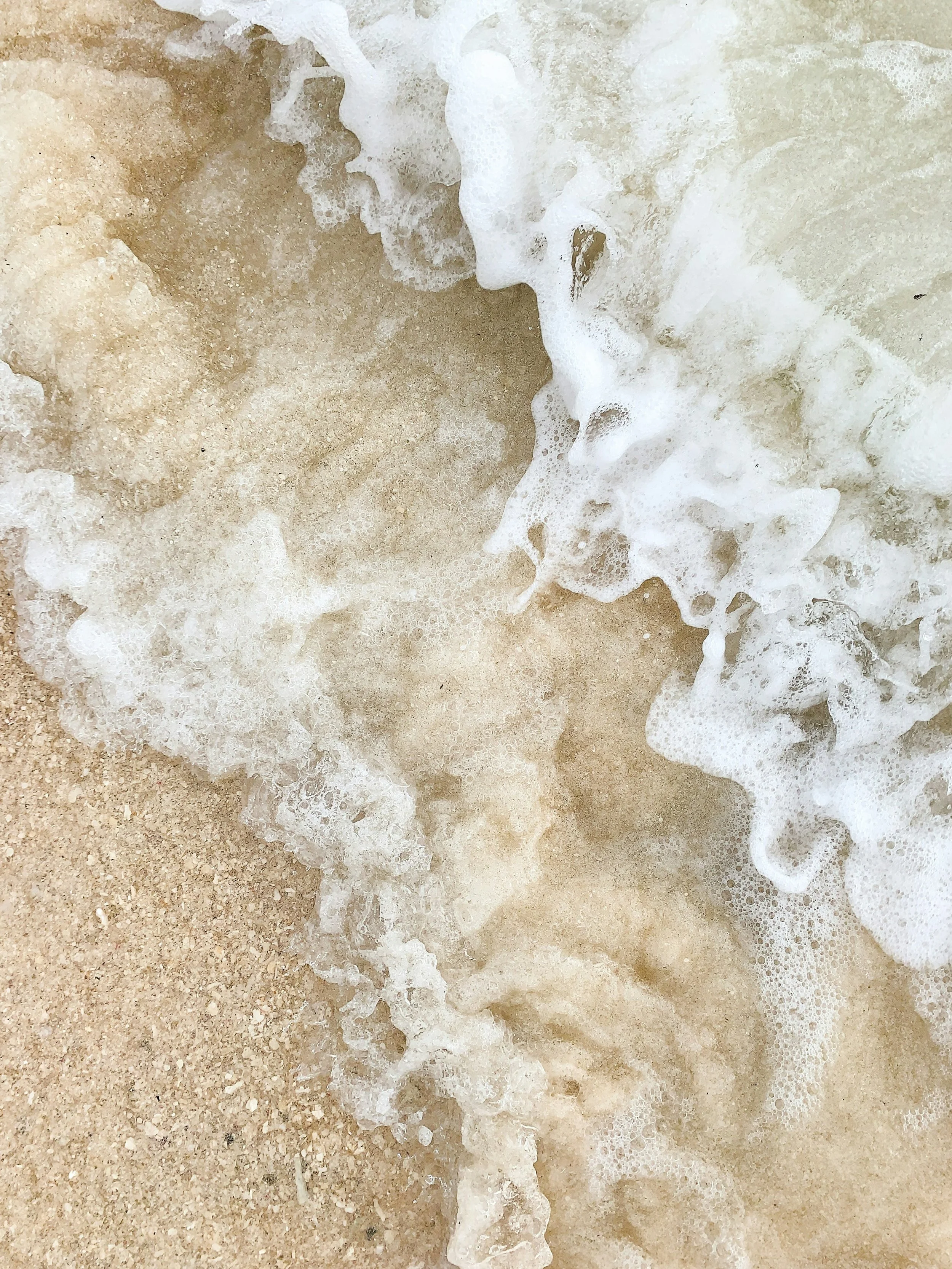 Ocean waves washing onto sandy shore in Redondo Beach, symbolizing calm, clarity, and renewal—reflecting the grounding support of anxiety and stress therapy.