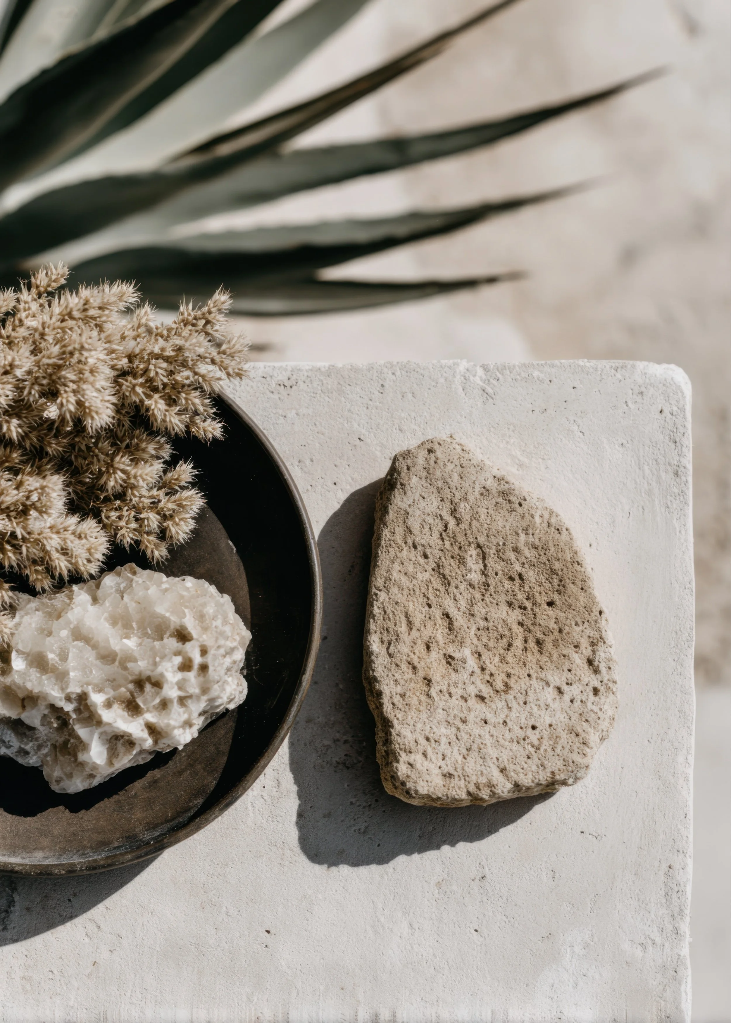 Calming natural decor with stone, crystal, and botanical elements