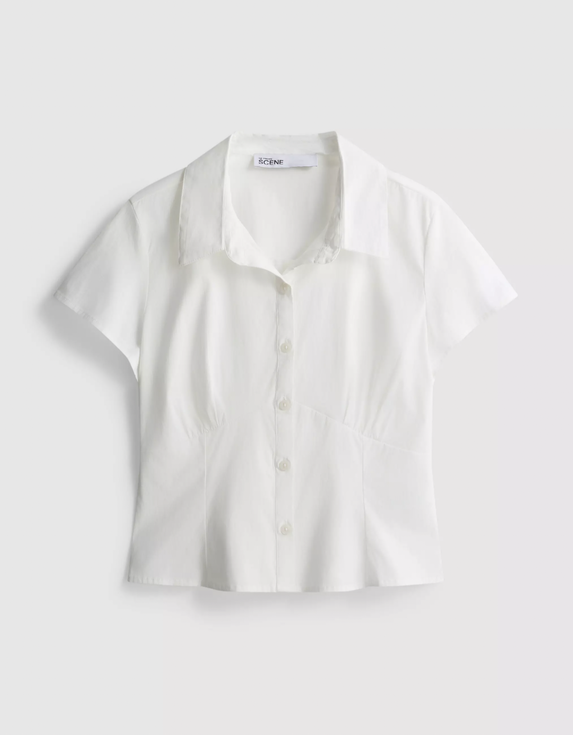 White short-sleeve button-up blouse with a collar, displayed against a light background. The design is simple and elegant, conveying a classic style.