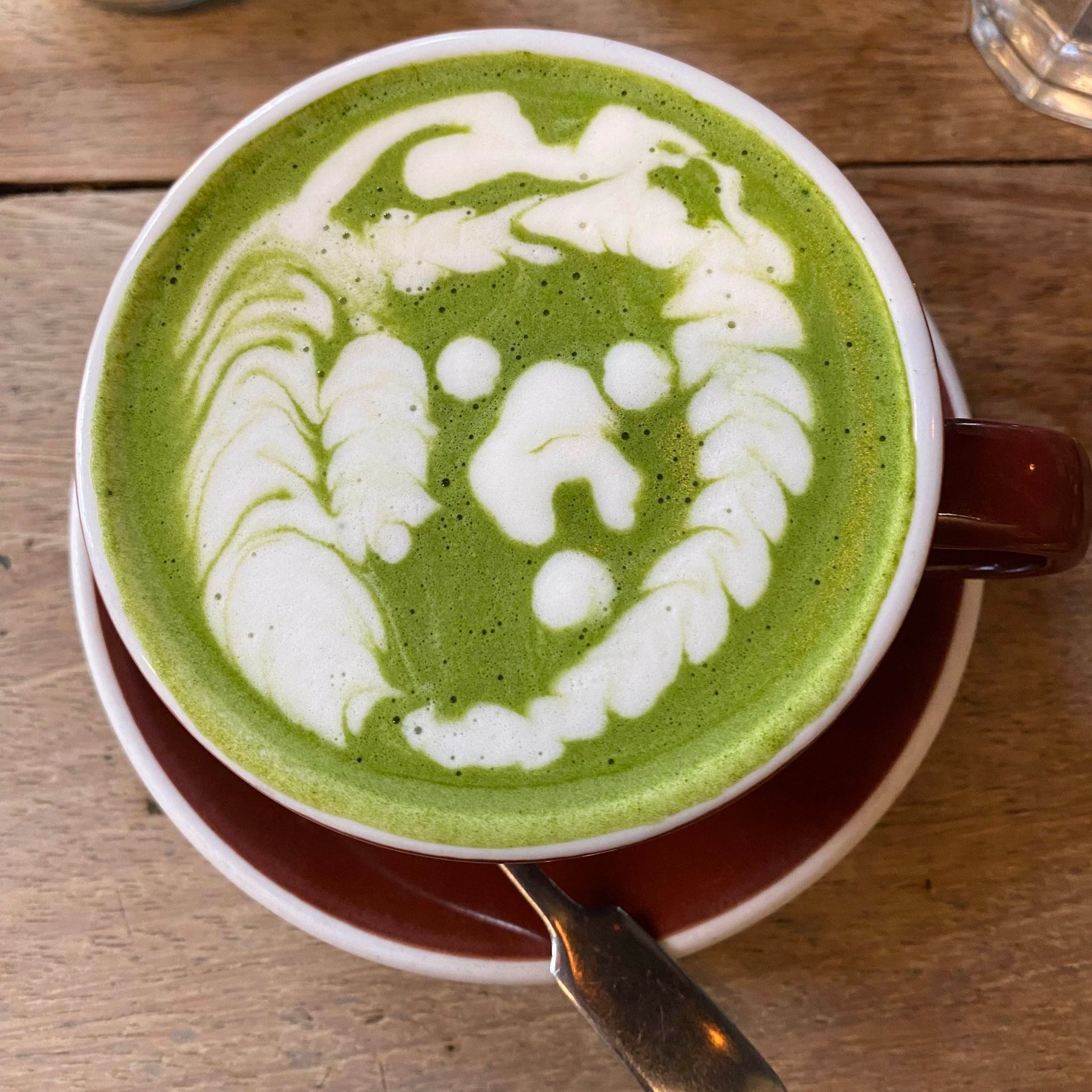 A cup of matcha with latte art