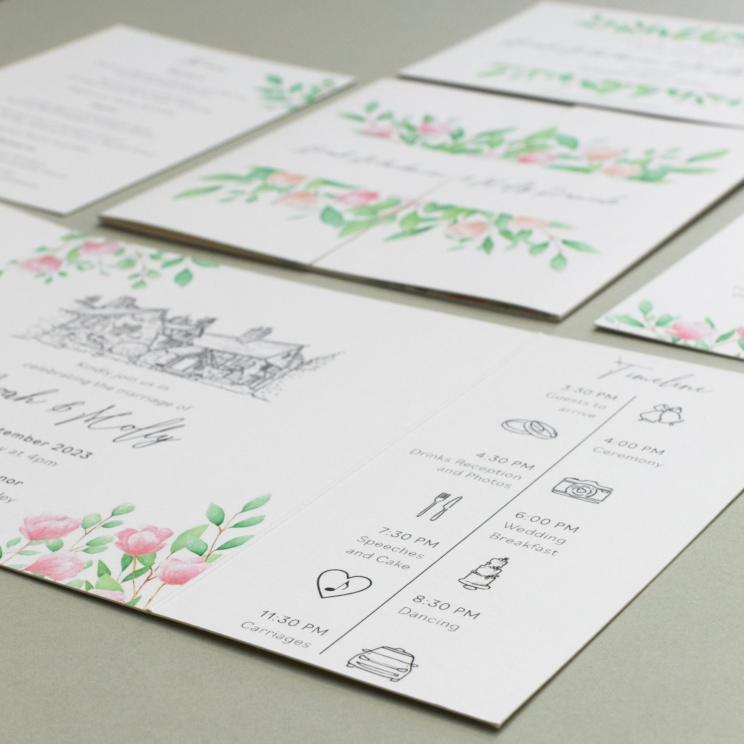 Close up photo of a wedding invitation featuring a simplistic line illustration of the ket timings of their day