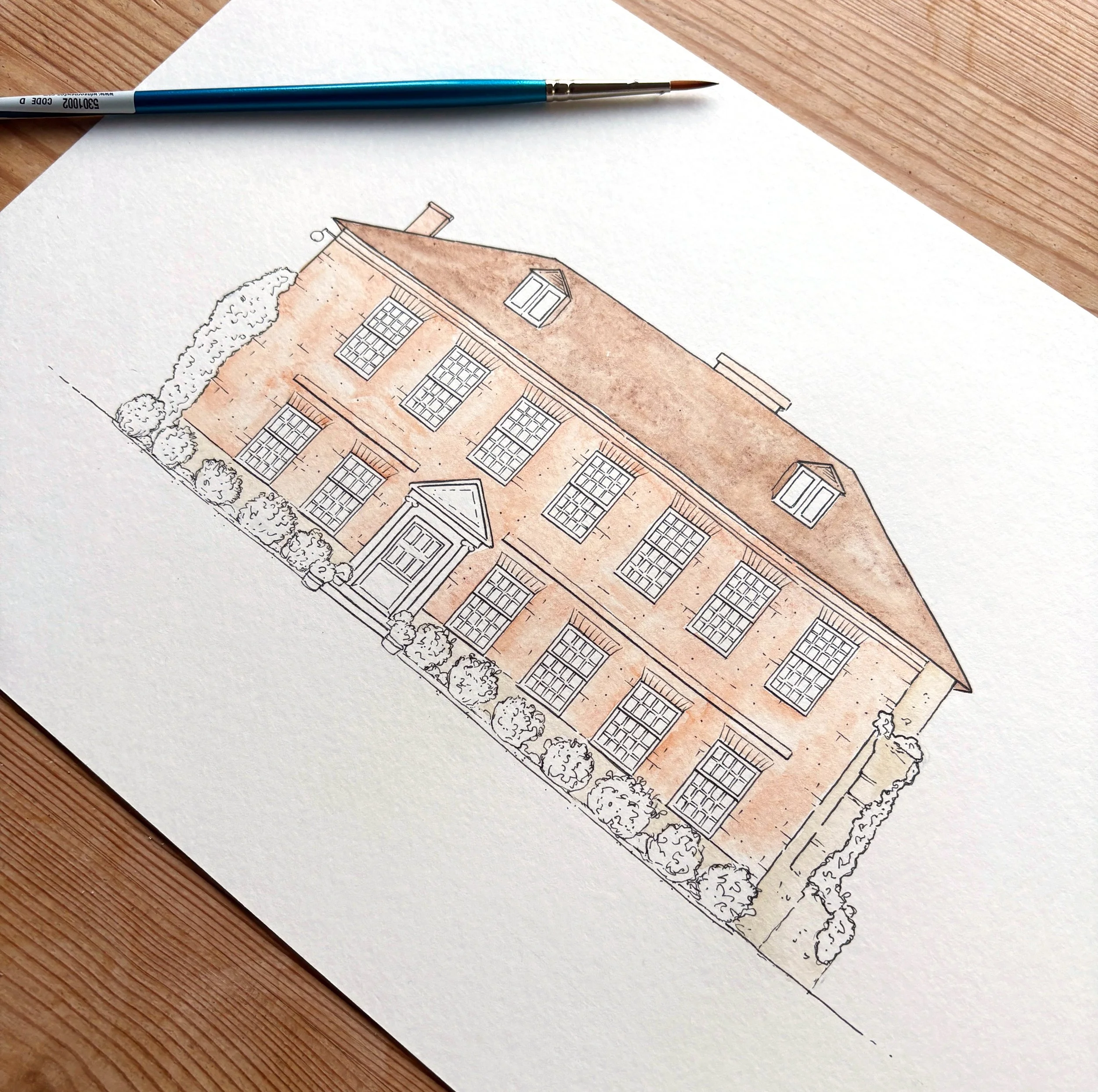 Process shot of an illustration of the venue at Westenhanger Castle, Kent, drawn as part of a wedding invitation design using pen and watercolour paints