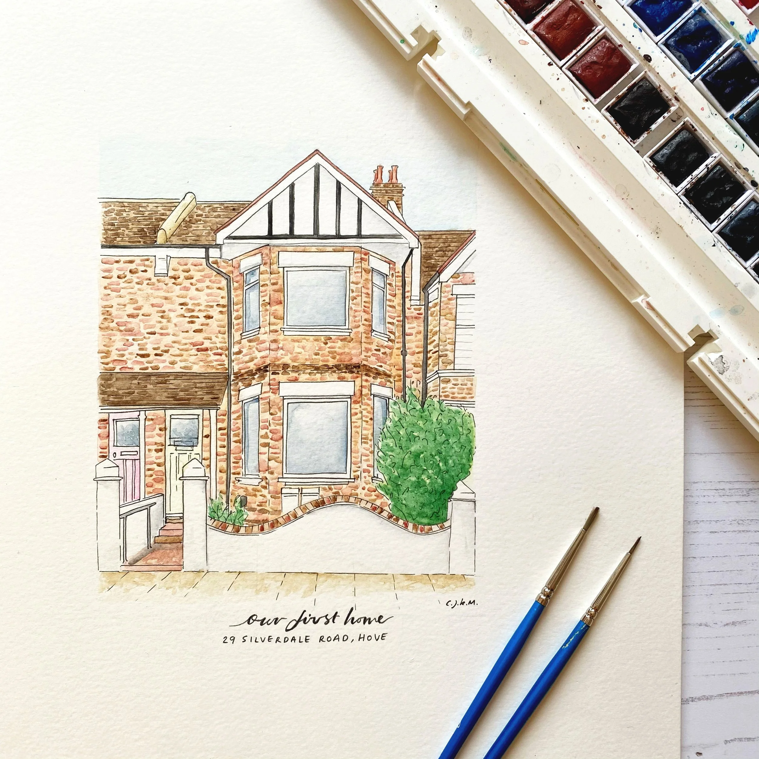 Watercolour illustration of a couples first home together, with the address details added below.