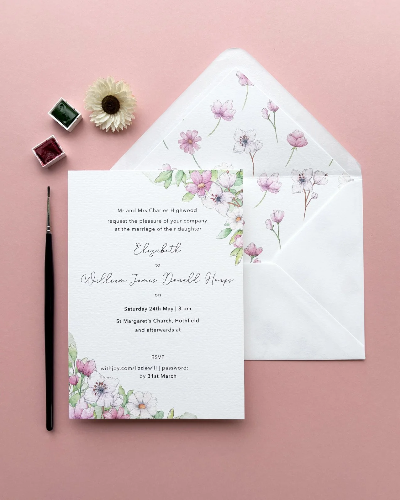 Watercolour wedding invitation, inspired by blush pink florals. On the invitation they are paired with green vine on the envelope liner floating in a pattern
