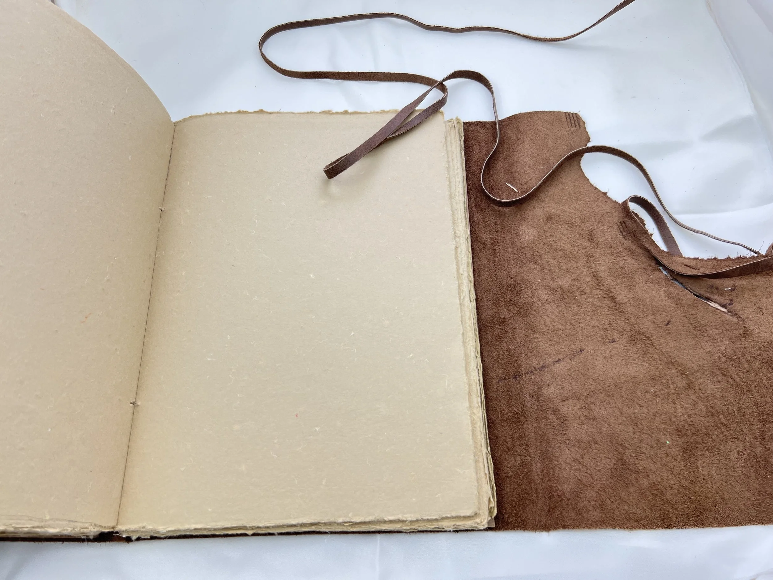 9x12 brown leather deckle paper journal open