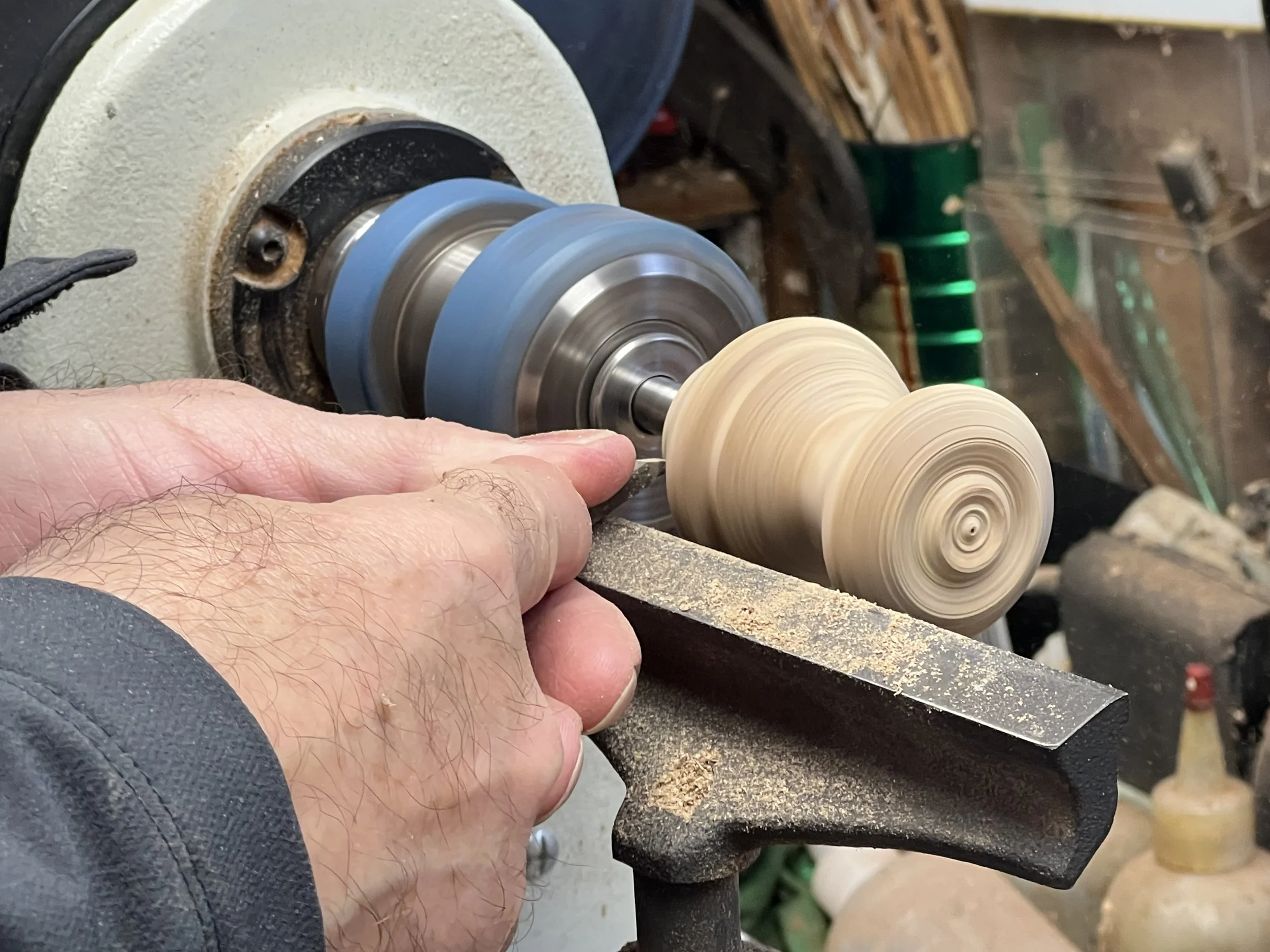 Turning a wine bottle stopper.