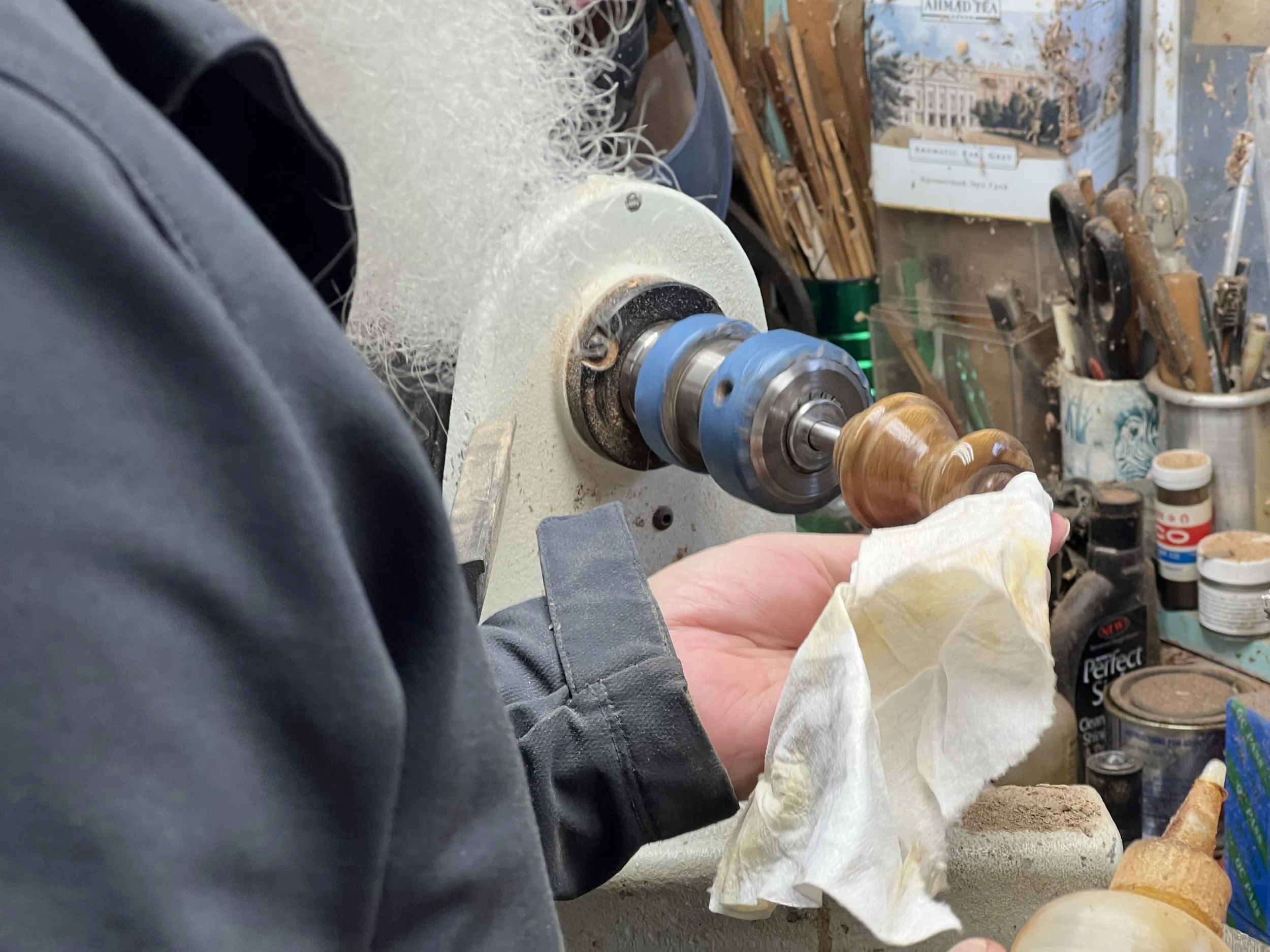 Finishing touches on a wine bottle stopper.