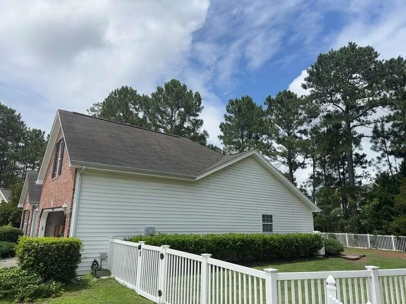 Before roof replacement with Black Shadow shingles in Carolina Forest, SC