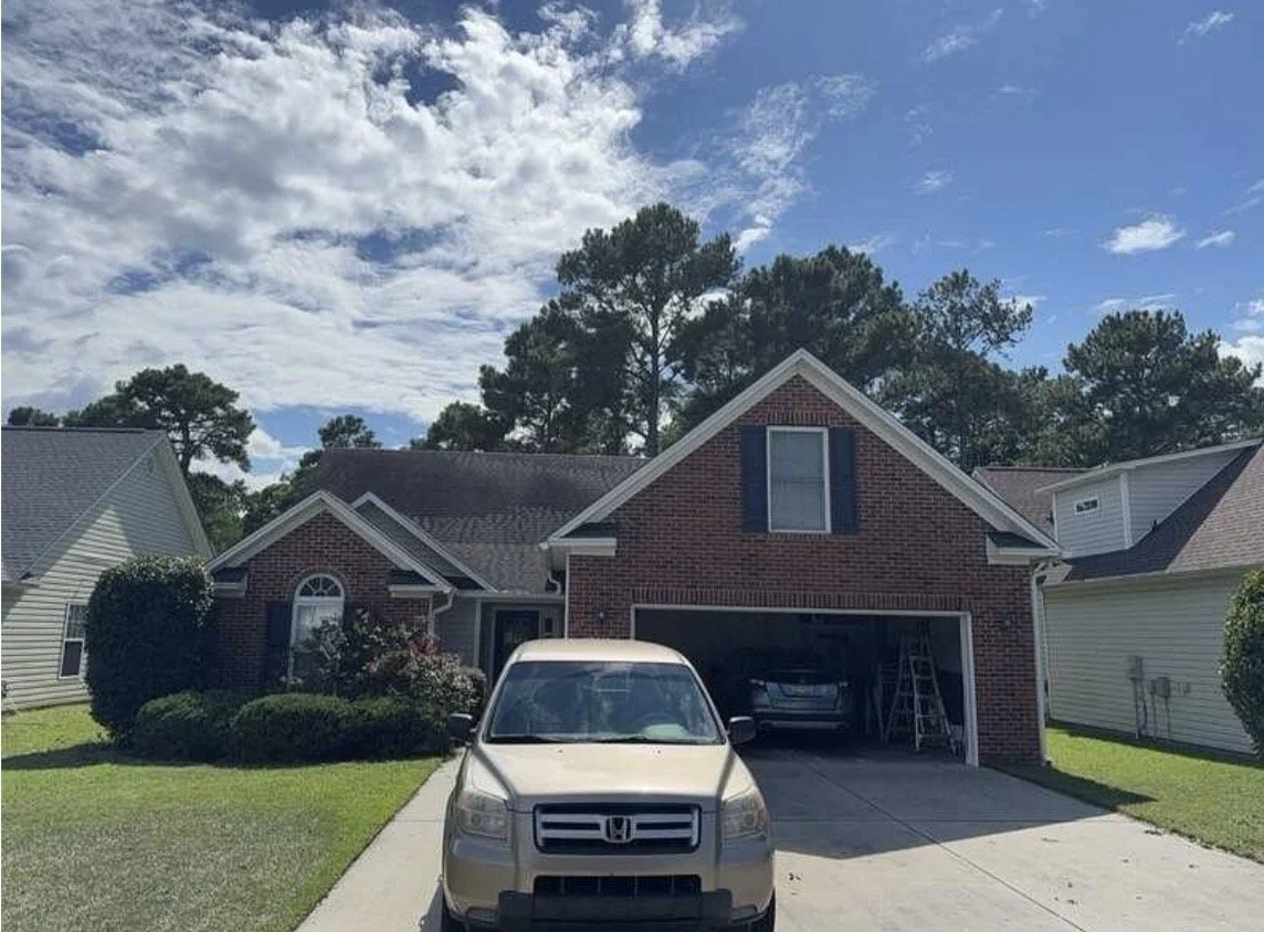 Before roof replacement on a residential home in Carolina Forest, SC, by Bear Roofing LLC.