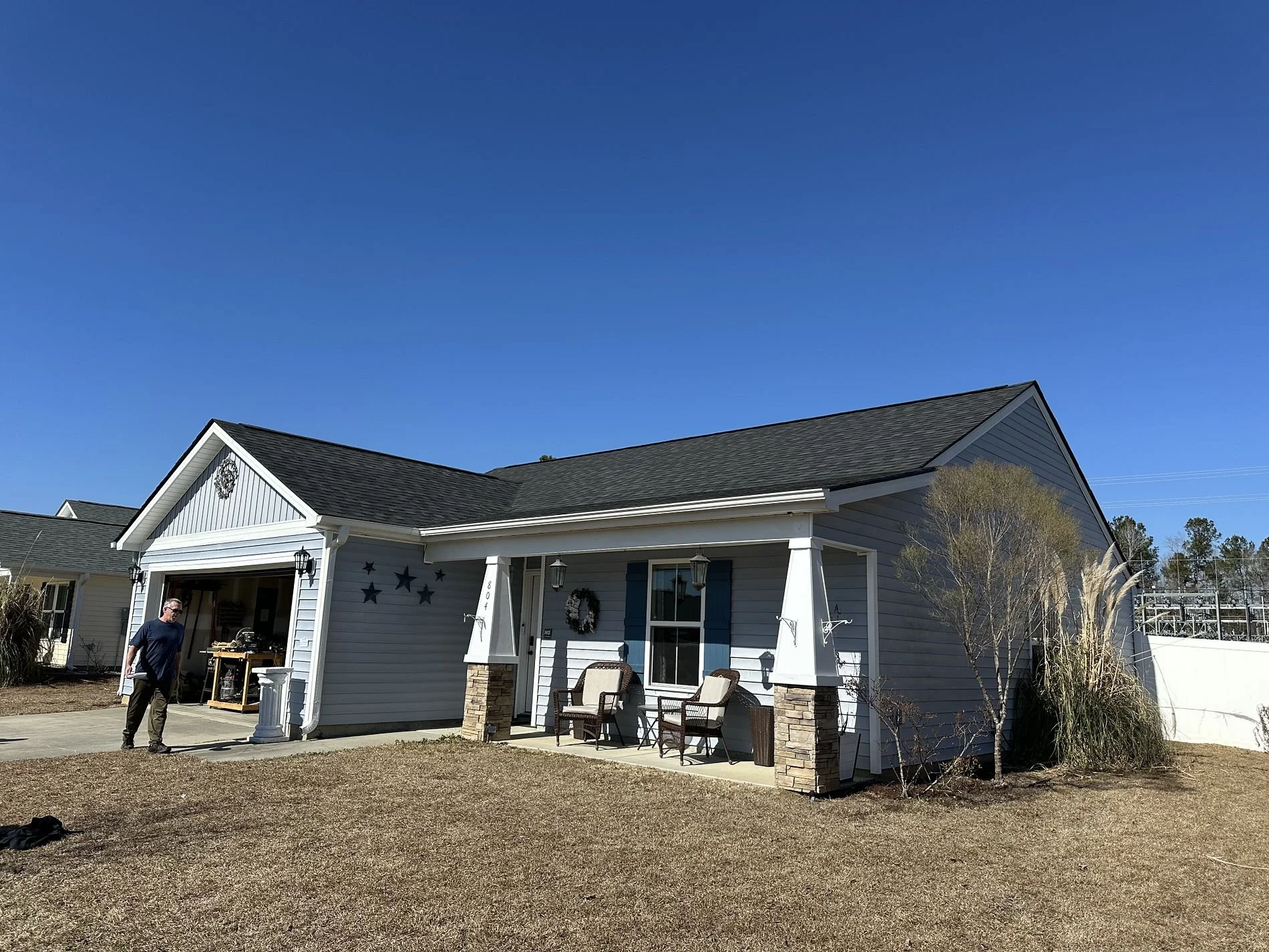 Completed roof replacement in Conway, SC featuring IKO Dynasty shingles in Granite Black, installed by Bear Roofing LLC