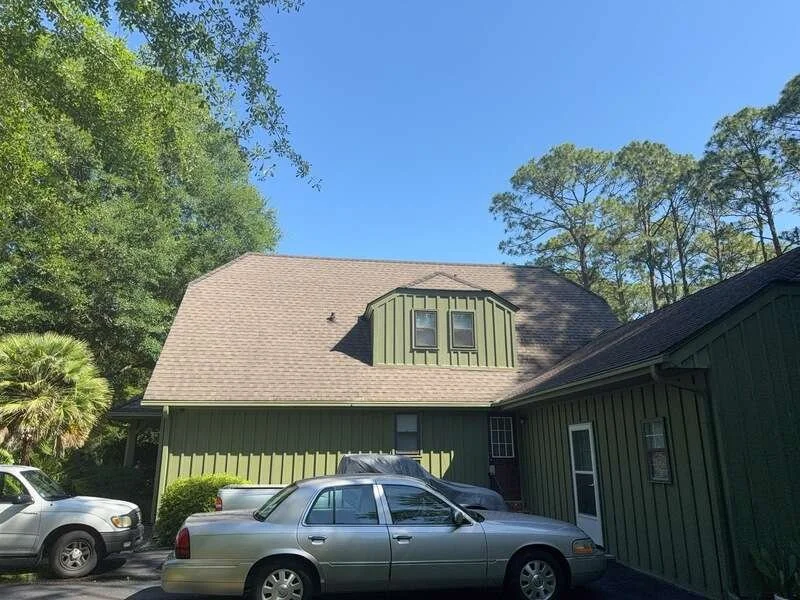 Green residential home in Conway, SC before roof replacement by Bear Roofing LLC