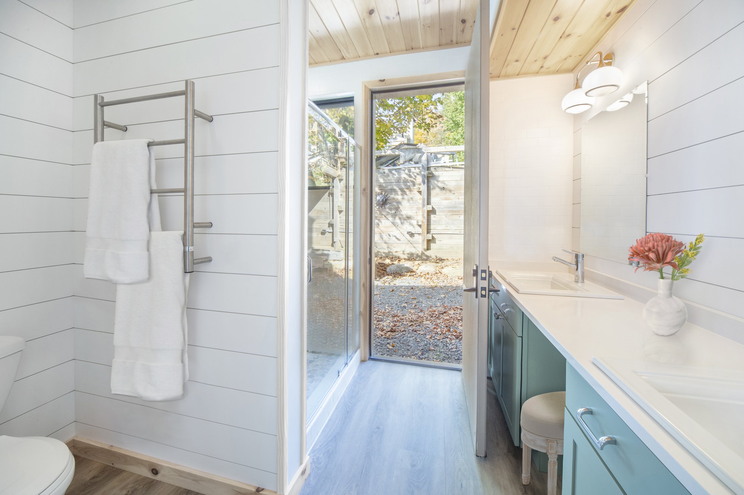 bathroom with wood ceiling