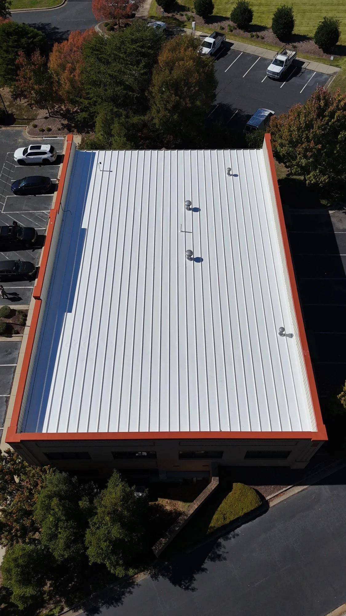 Commercial roofing: the finished coated metal roof seen from directly overhead.