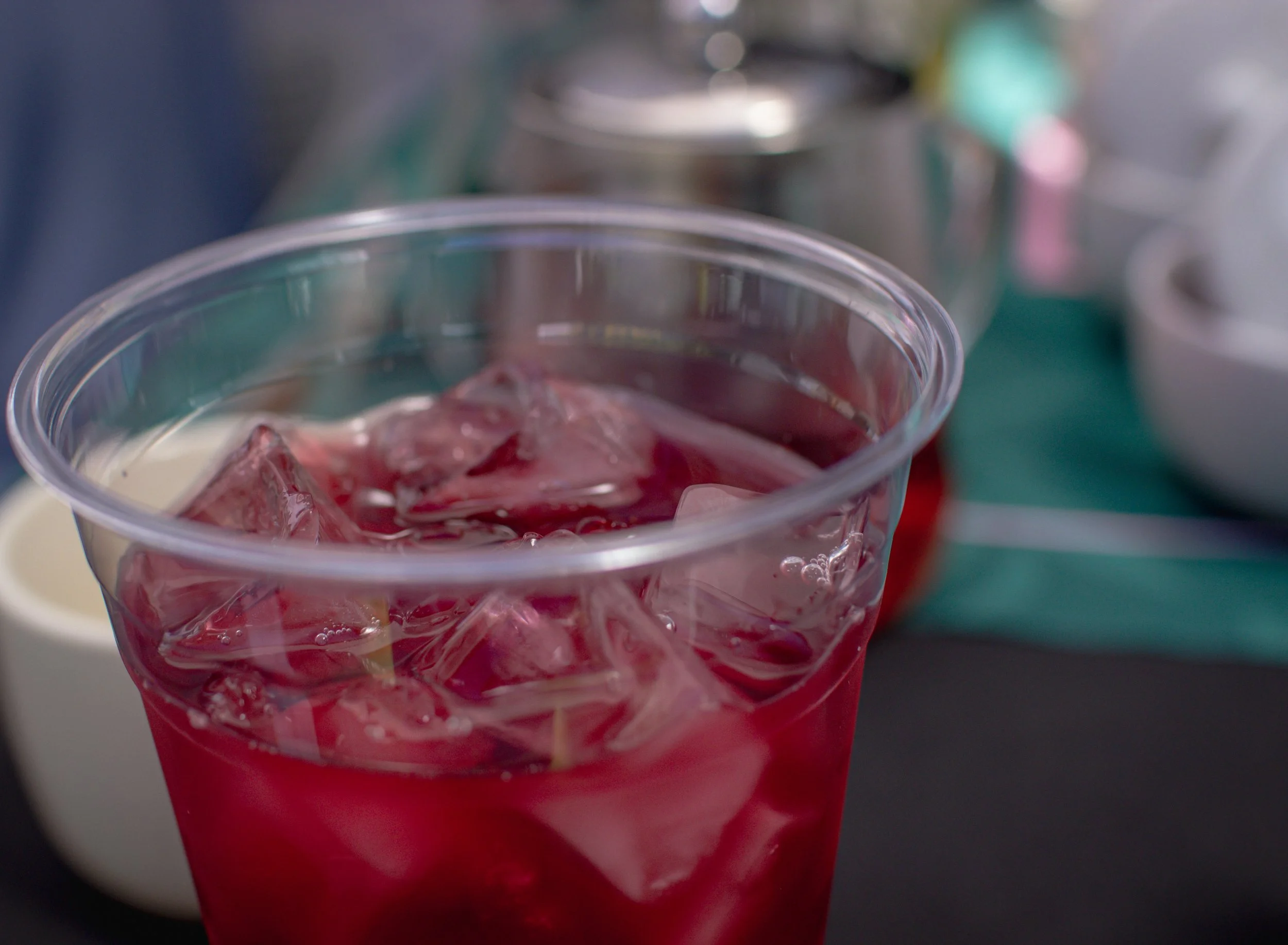 a plastic cup of hibiscus iced tea