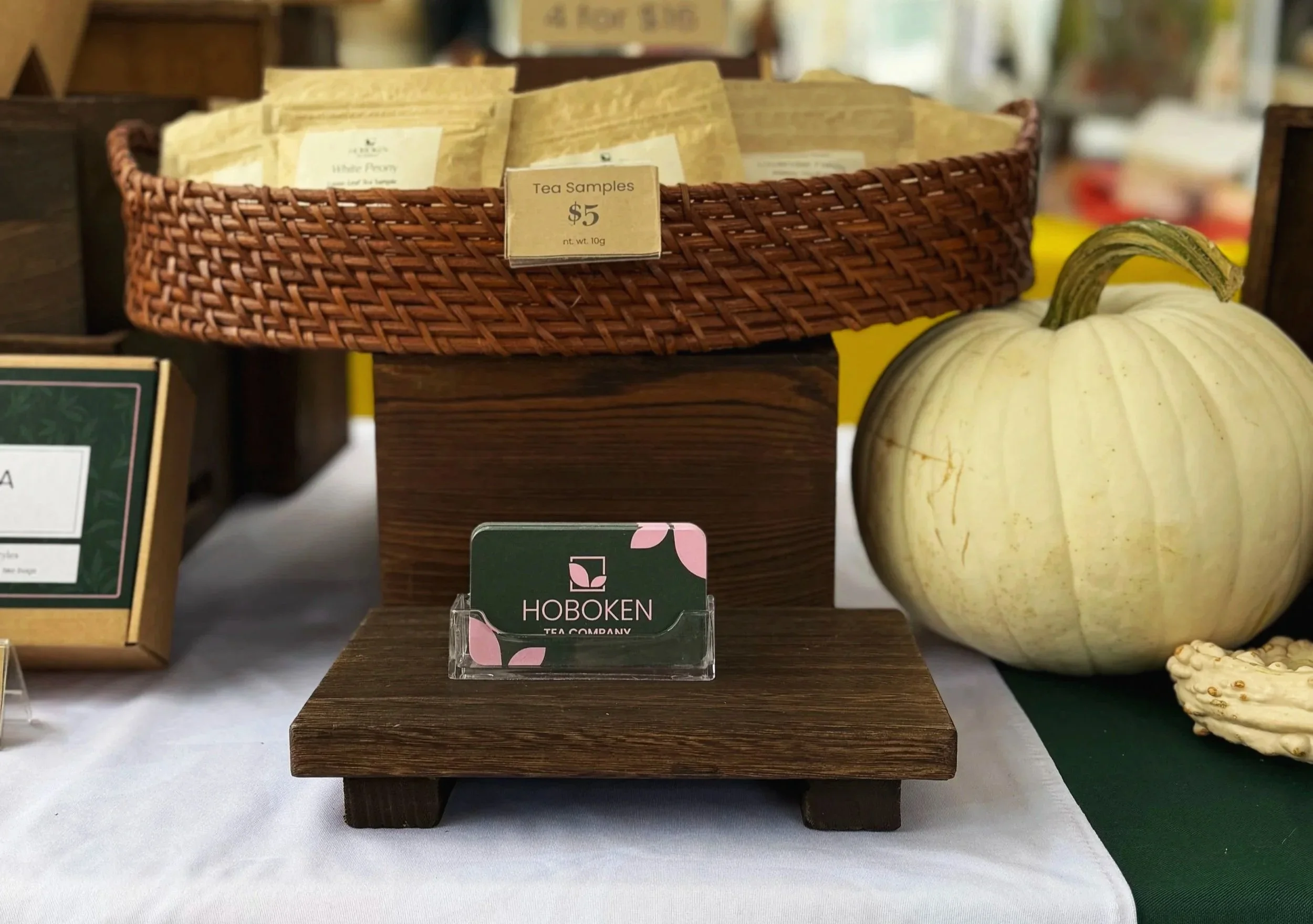 Hoboken Tea Company business cards set on a farmers market table display