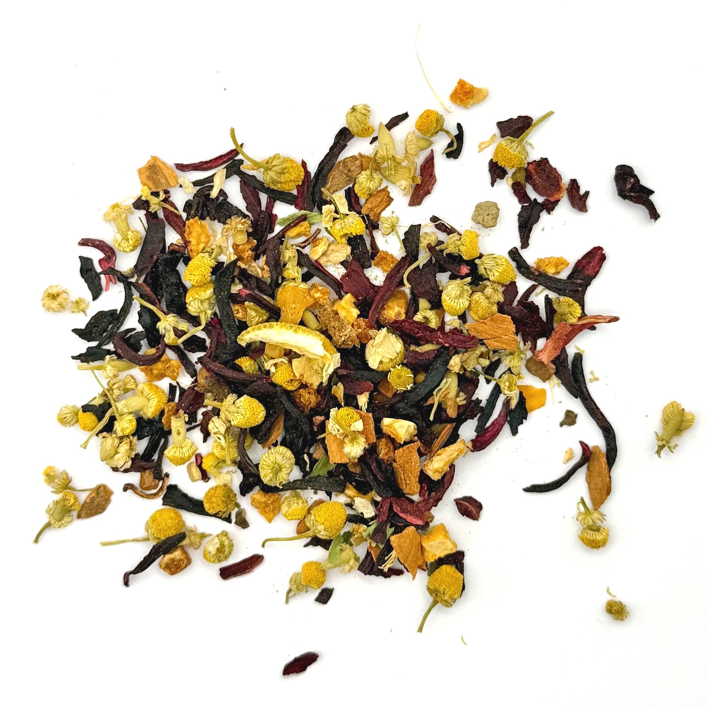 a pile of loose leaf herbal tea with hibiscus, orange, and cinnamon on a white background