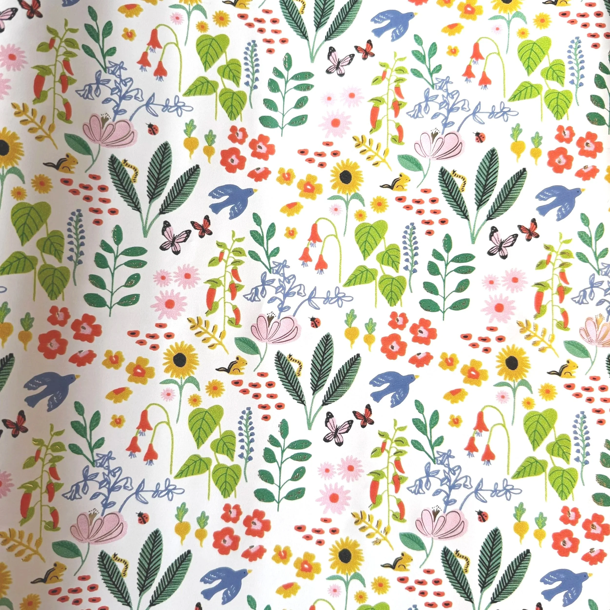 wrapping paper with colorful flowers and birds pattern