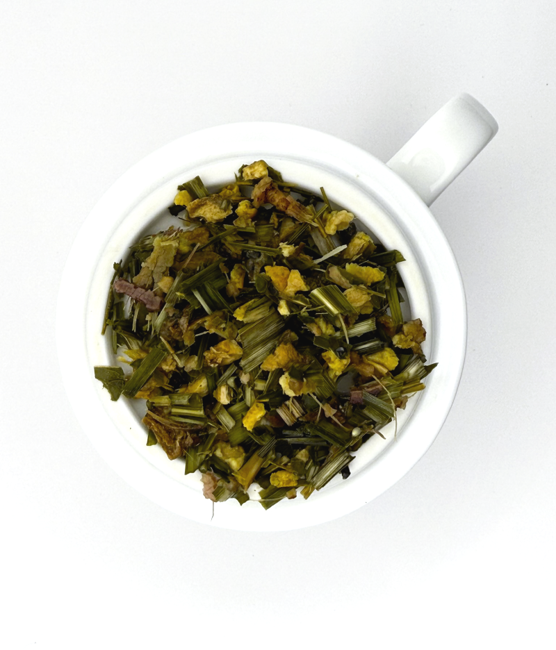 a pile of wet loose leaf herbal tea on a white background