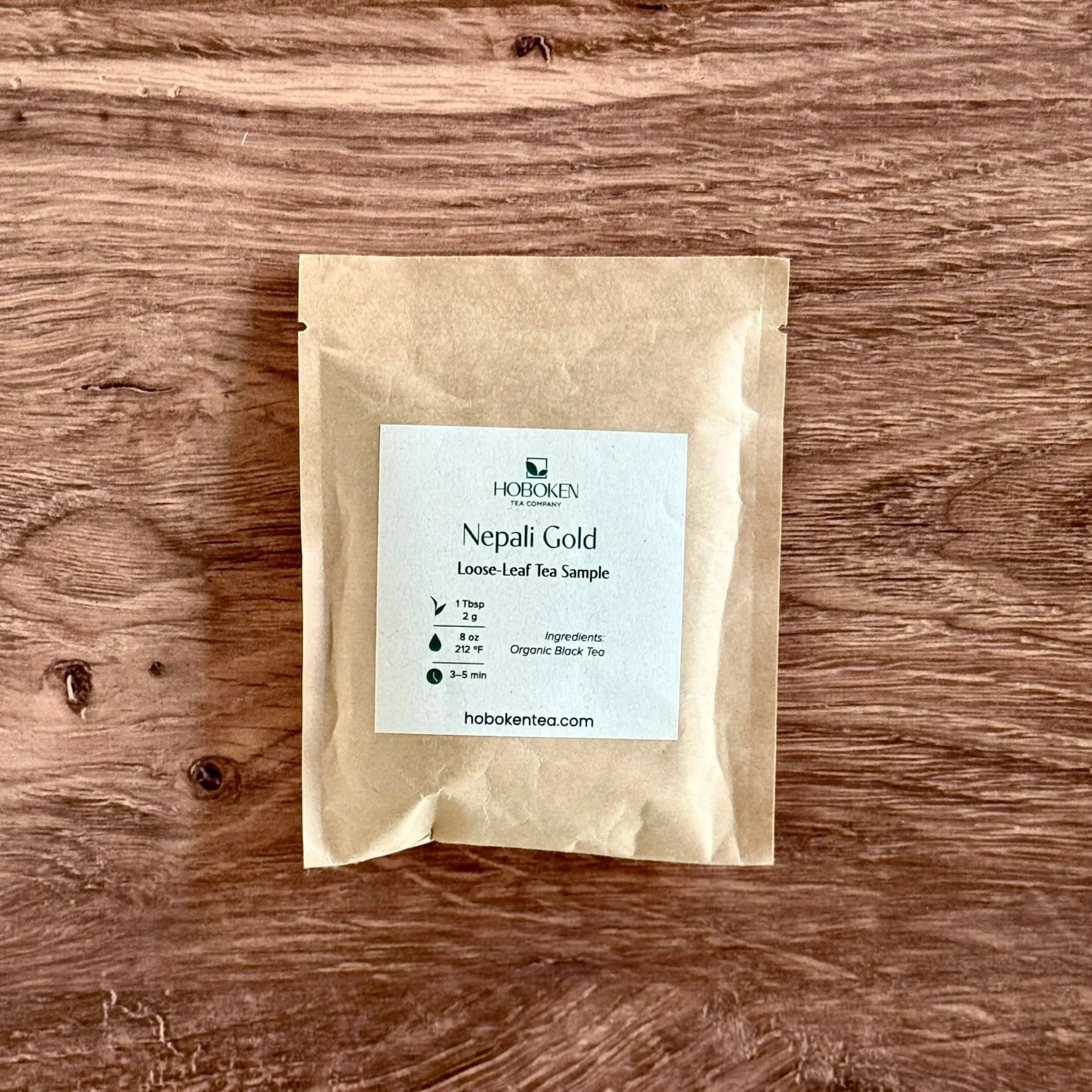 small brown paper packet of Nepali Gold organic black tea from Hoboken Tea Company