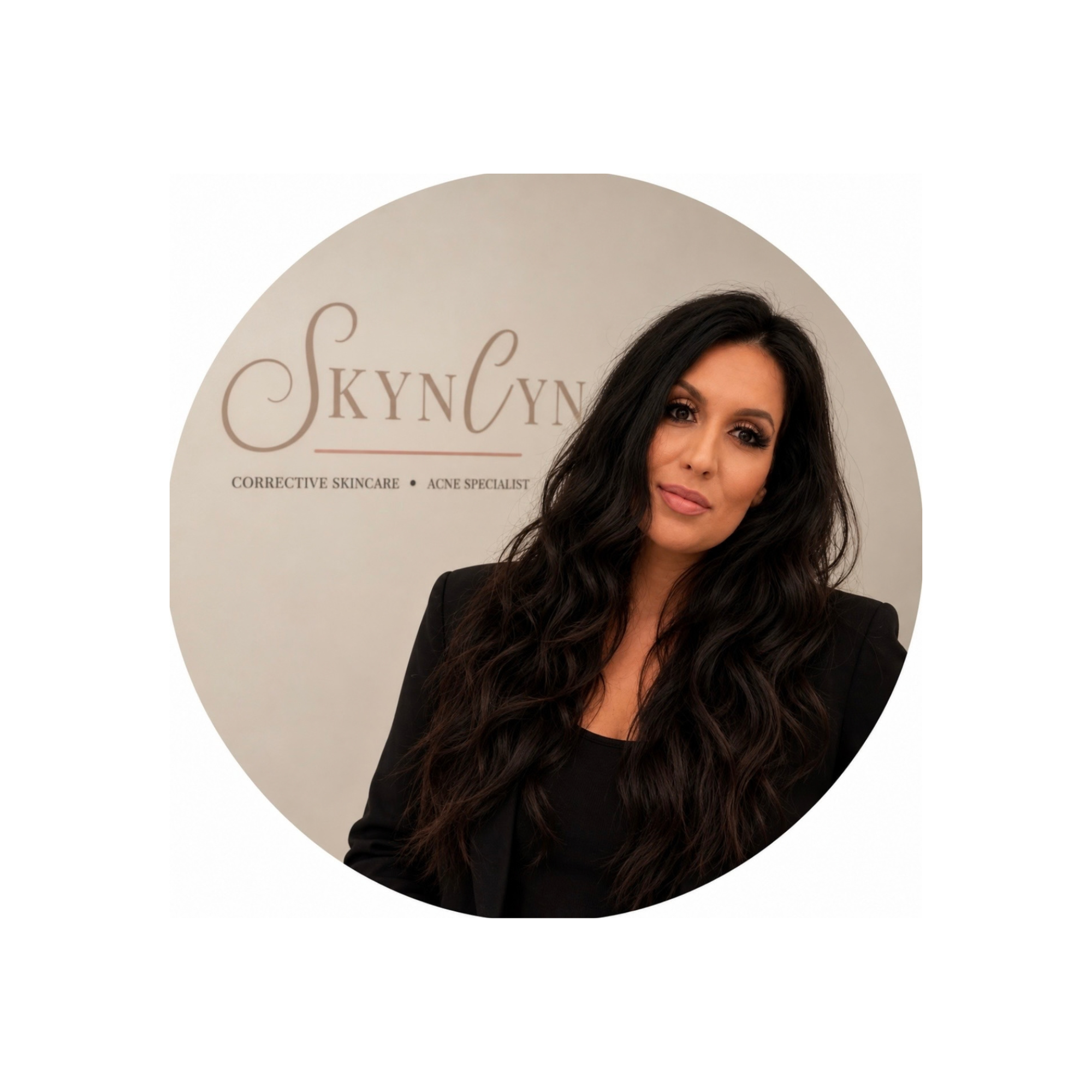 Woman standing behind Skyn by Cyn sign in the Inland Empire that offers corrective treatments in Riverside CA