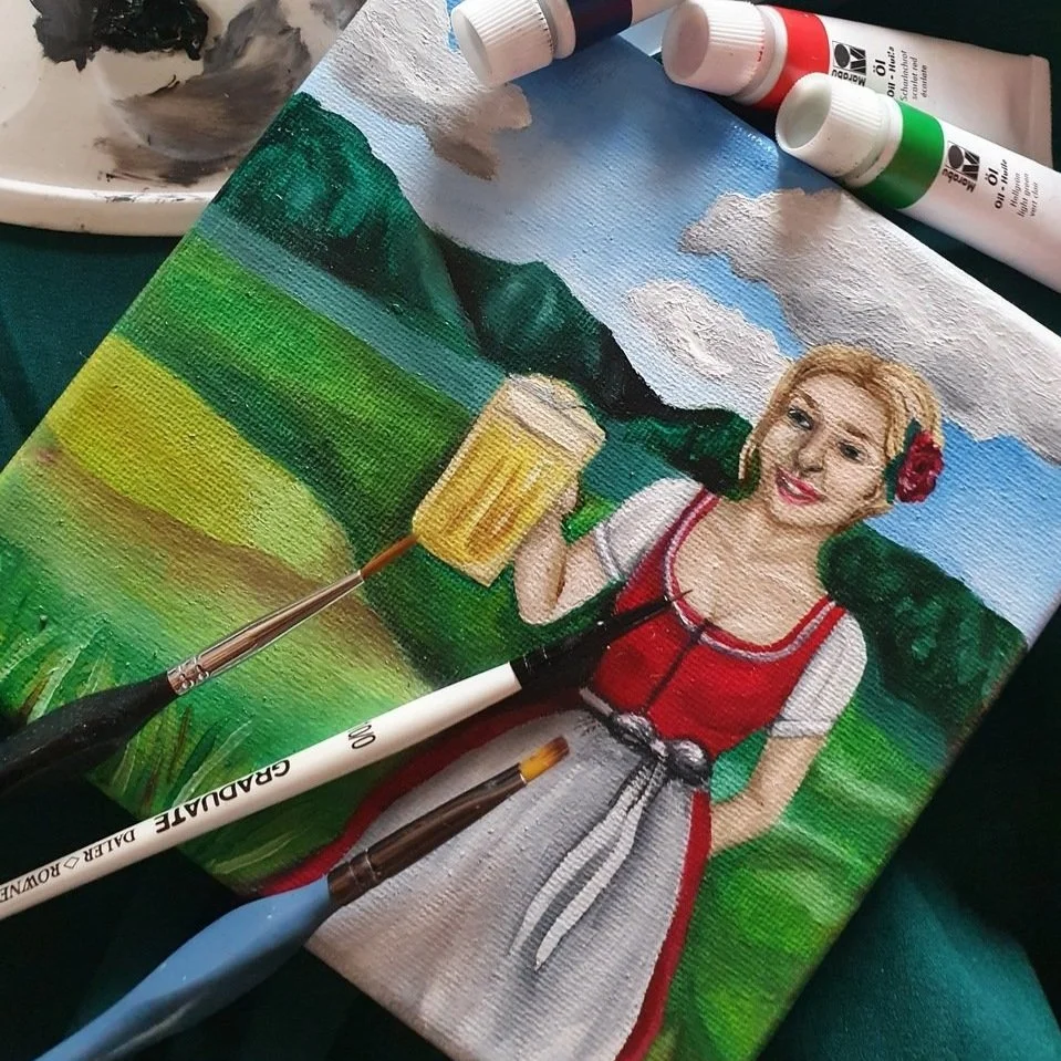 Bild-Frau-dirndl-hangemalt-bier.jpg