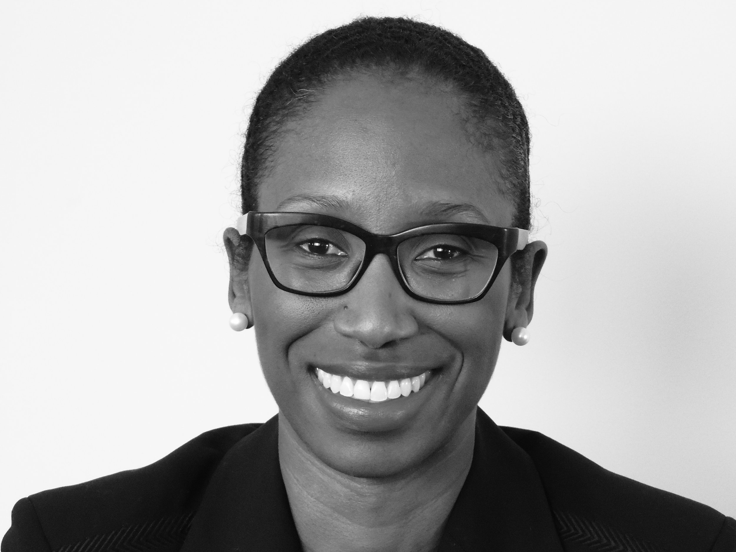 Headshot of Nicole Malcolm-Manyara