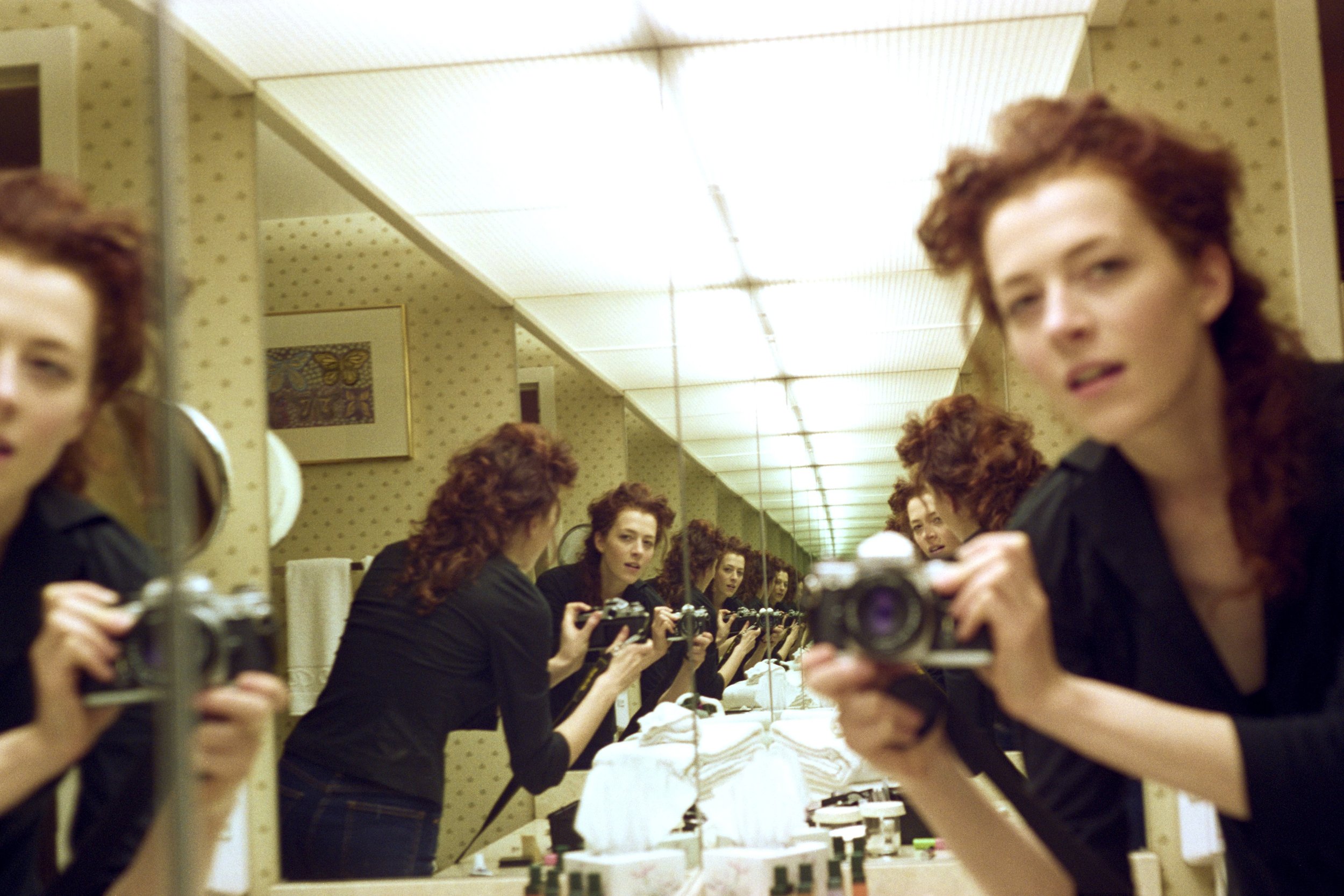 Melissa Auf der Maur, Infinite Self-Portrait in Hotel Bathroom, 1999.