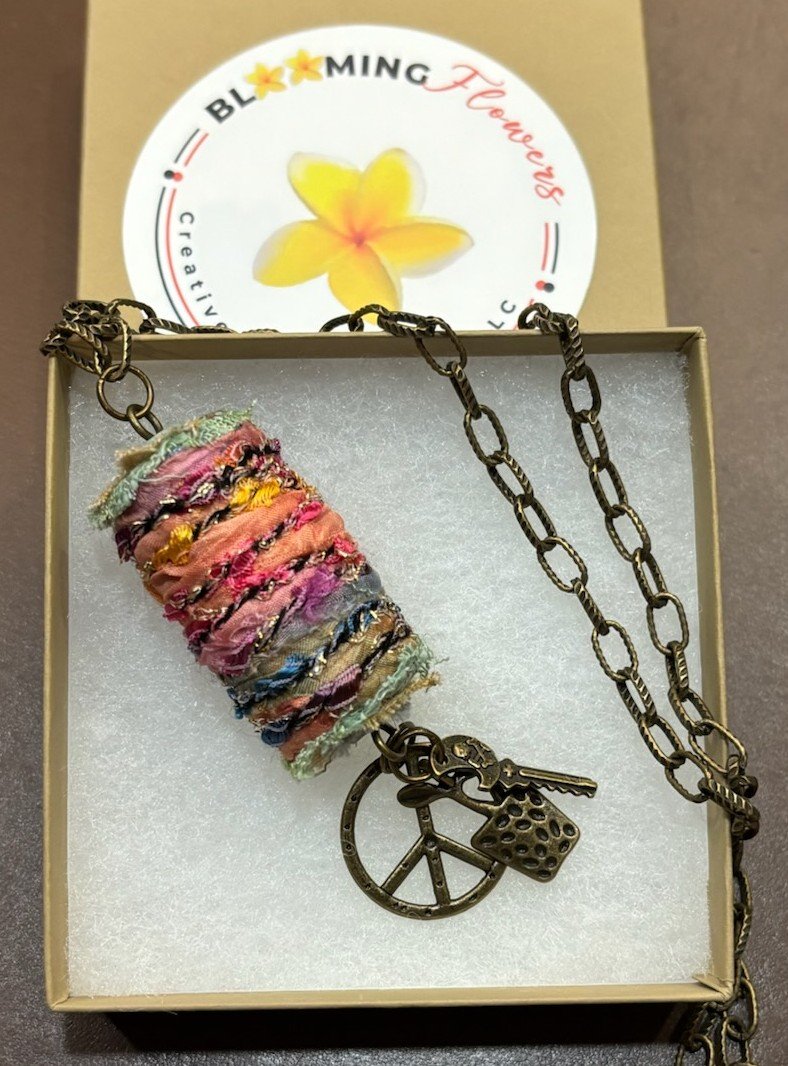 TEXTILE NECKLACE WITH PEACE SIGN-ANTIQUE BRASS 2.15.26.jpg