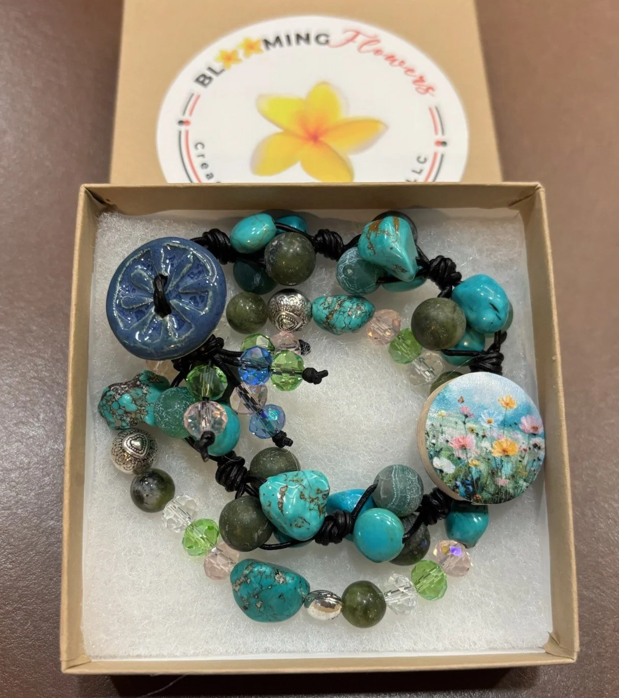 TURQUOISE AND STRETCH BRACELET WITH FLOWERS BUTTON BRACELET 12.11.25.jpg