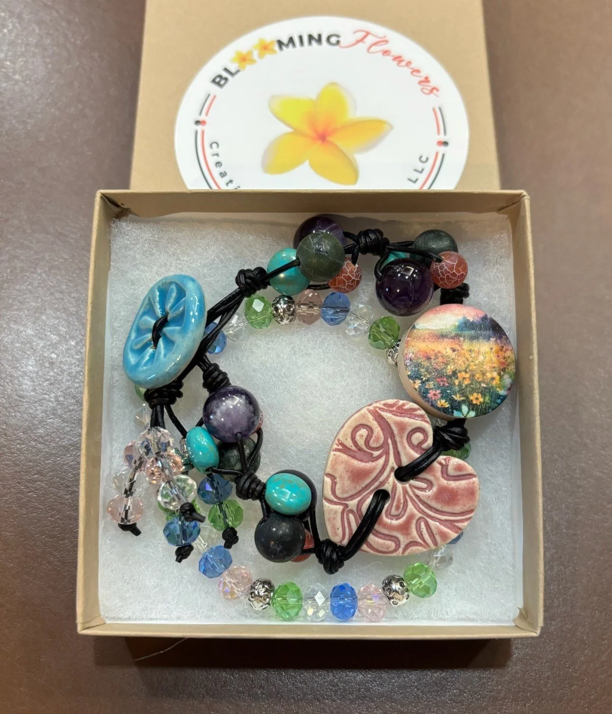 HEART AND FIELD OF FLOWERS BUTTON BRACELET 12.11.25.jpg