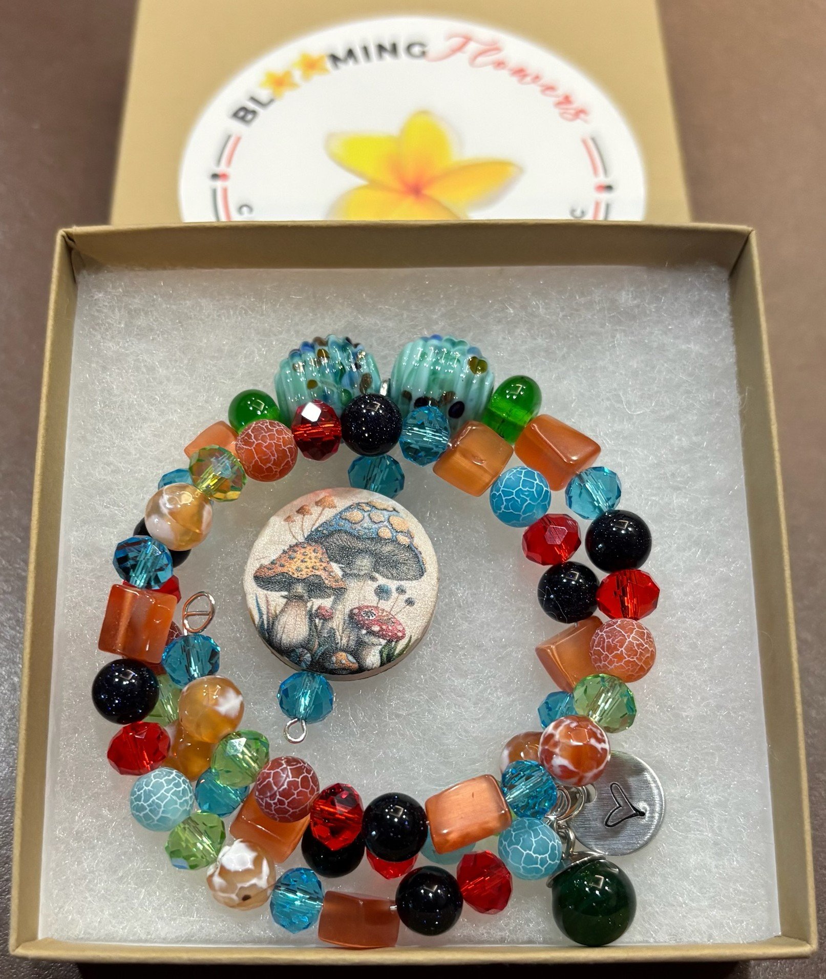 MUSHROOM WRAP BRACELET WITH LAMPWORK BEADS 2.15.26.jpg