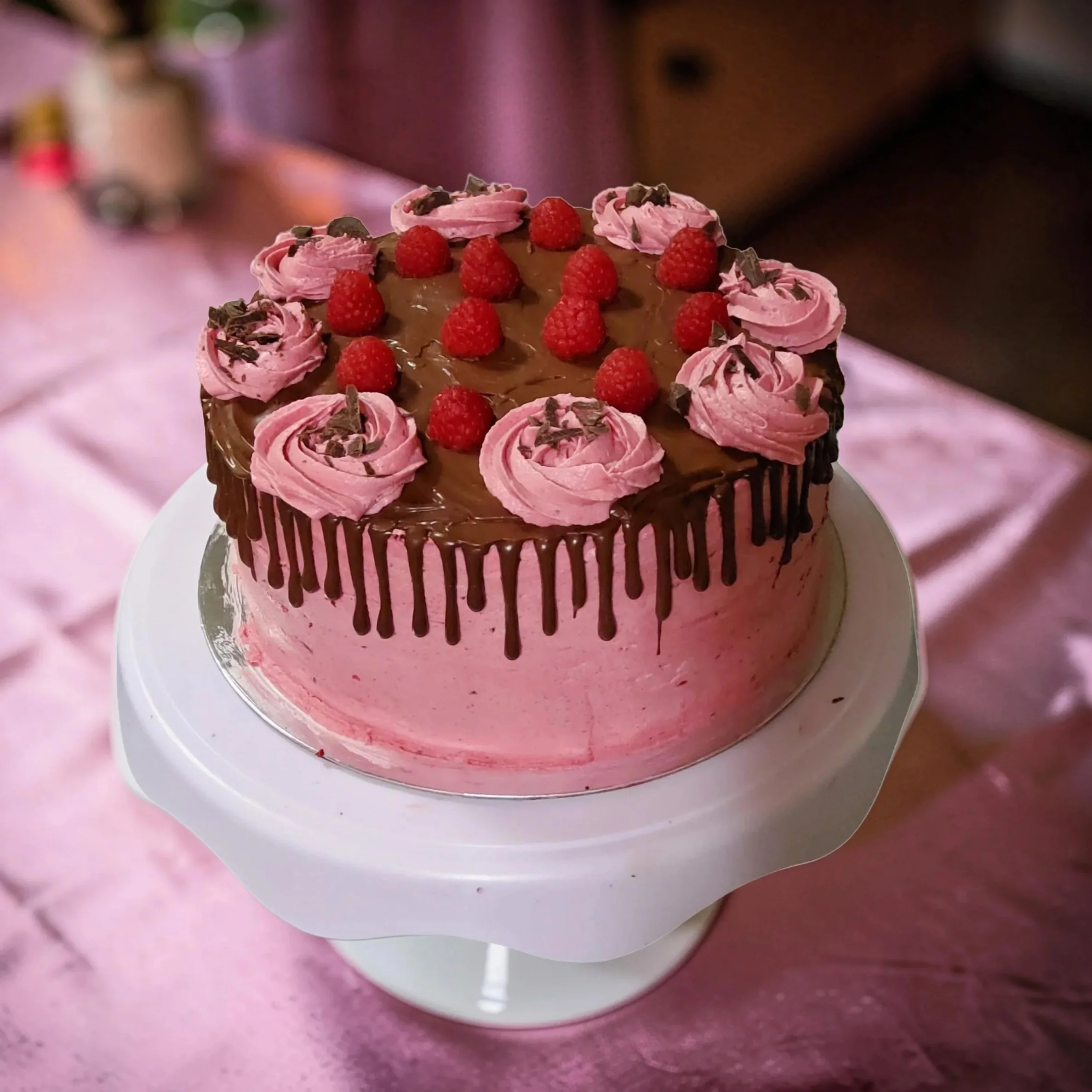 Plant-based 2-layer/9-inch round/chocolate raspberry cake/raspberry frosting/chocolate ganache dripping