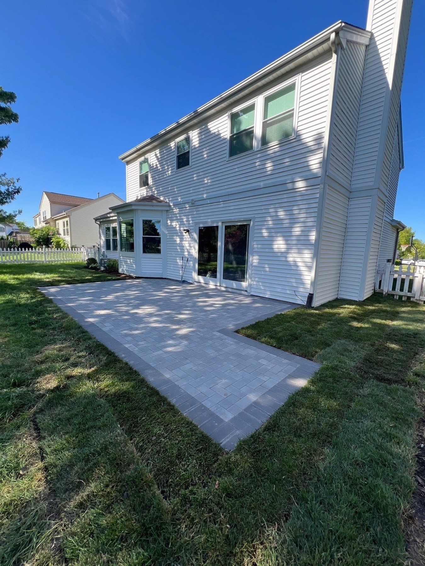 Imagine stepping into your backyard oasis&mdash;a stunning patio where memories are made, mornings begin, and evenings unwind. With ETB Landscapes, we&rsquo;ll bring that vision to life using Unilock Holland Premiere Pavers in Granite, complemented b