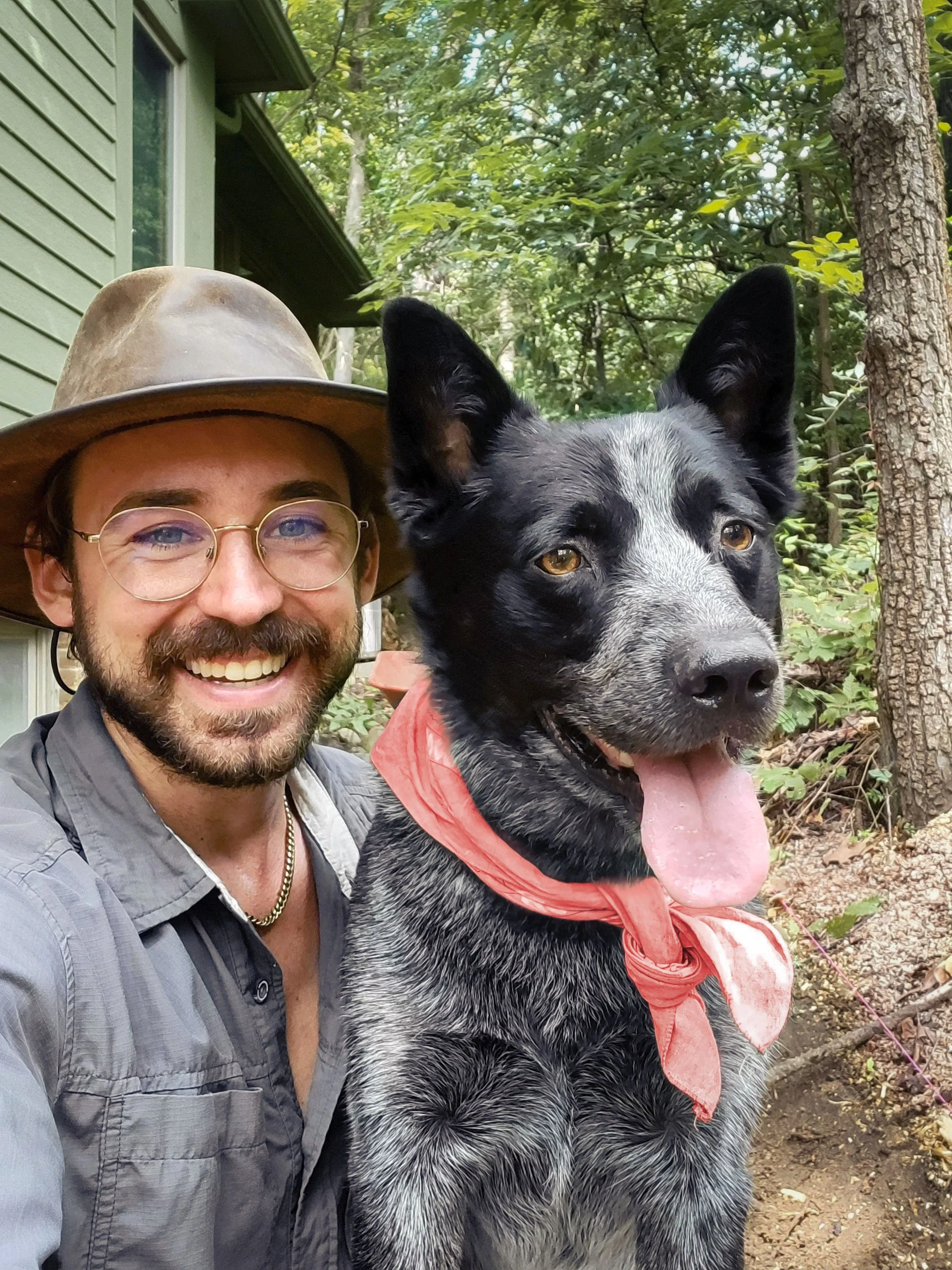 Joseph Stolarski the owner of Revolutionary Gardens with his dog Baloo